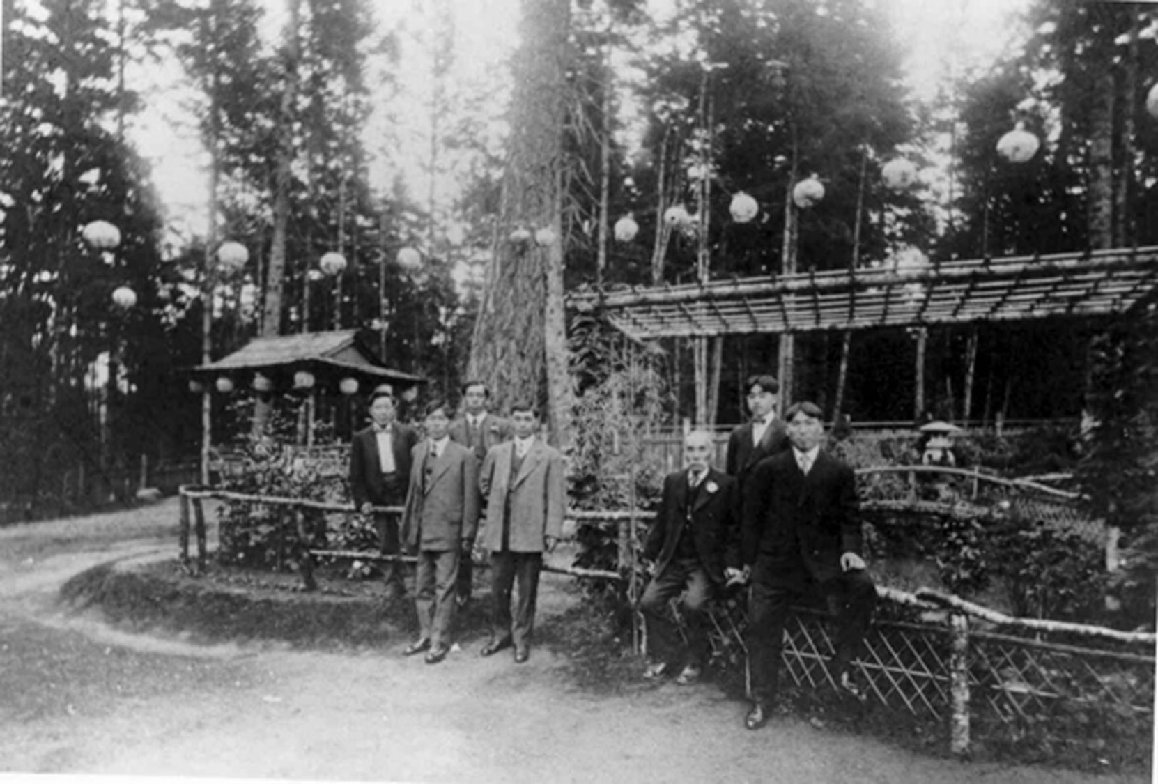 Isaburo Kishida (seated third from right) with his son Joe Kishida and his business partner Harry Takata, at the Japanese Tea Garden, Gorge Park, circa 1907 Photo: Esquimalt Archives)