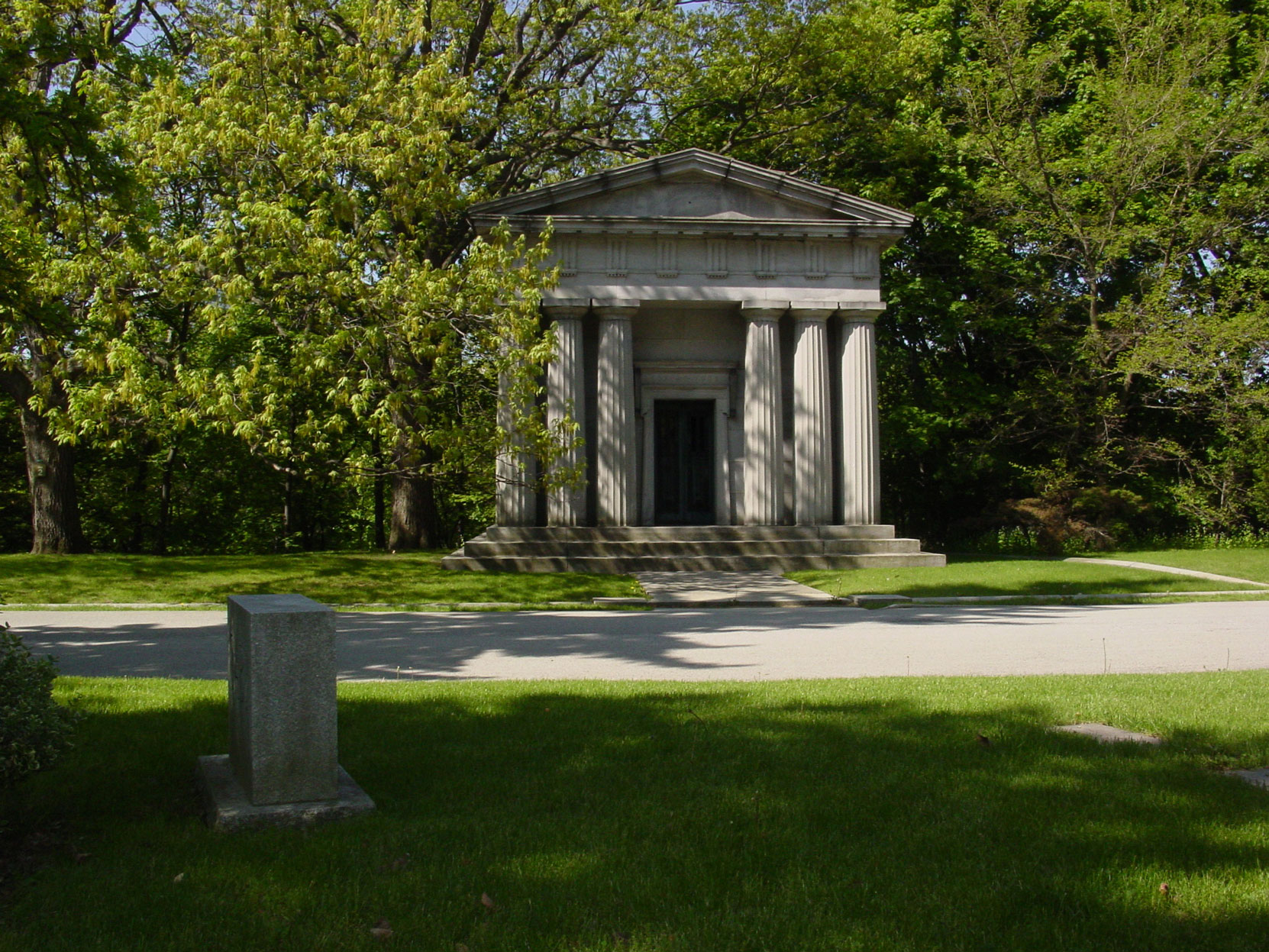 The graves of Senator George Albertus Cox (background) and Edward Rogers Wood (foreground) in Mount Pleasant Cemetery, Toronto, Ontario (photo by Author)