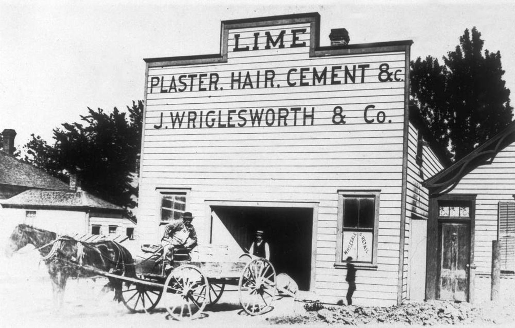 Joseph Wriglesworth & Co., Lime Dealers, on the south east corner of Yates Street and Blanshard Street in downtown Victoria, circa 1887 (BC Archives photo A-03469)