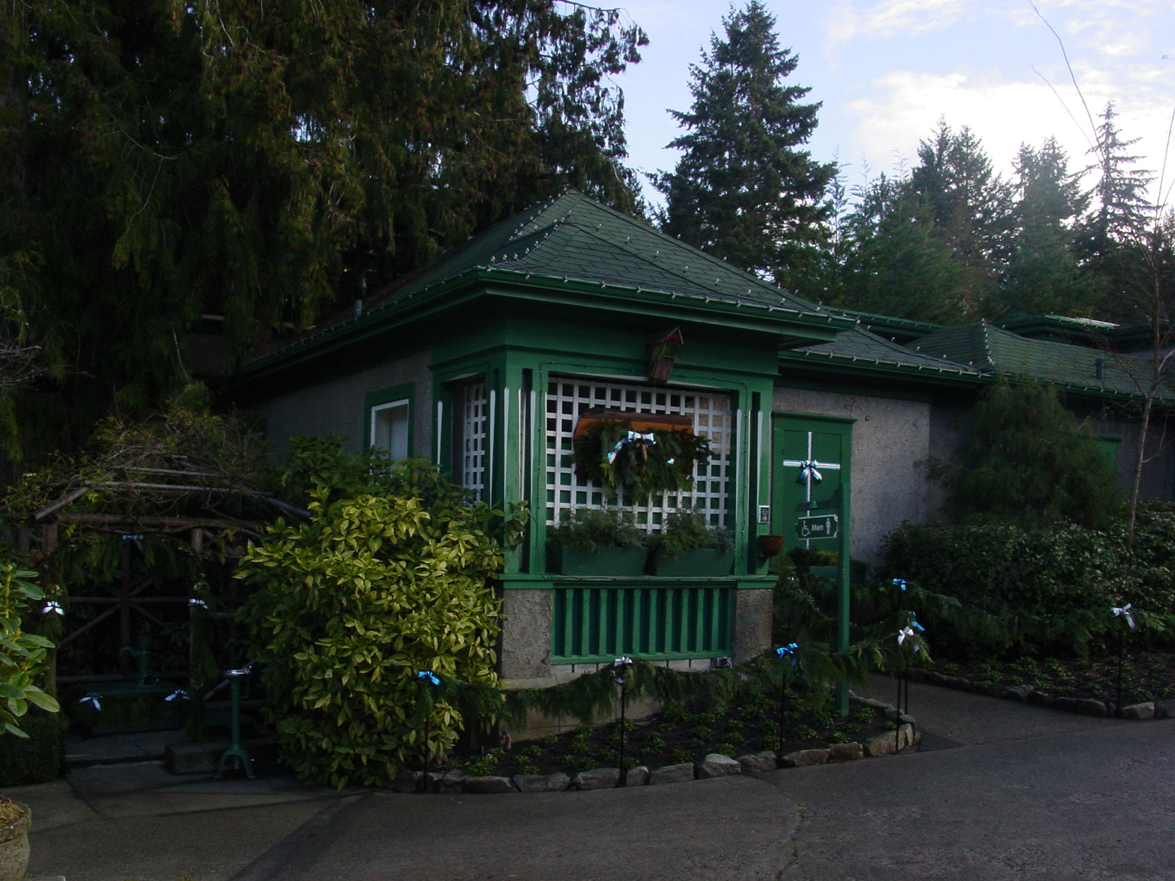 The "Chinaman's Cottage" designed by architect Samuel Maclure in 1917 as it appeared in November 2003. It is now a Men's washroom at Butchart Gardens. (Photo by Author).