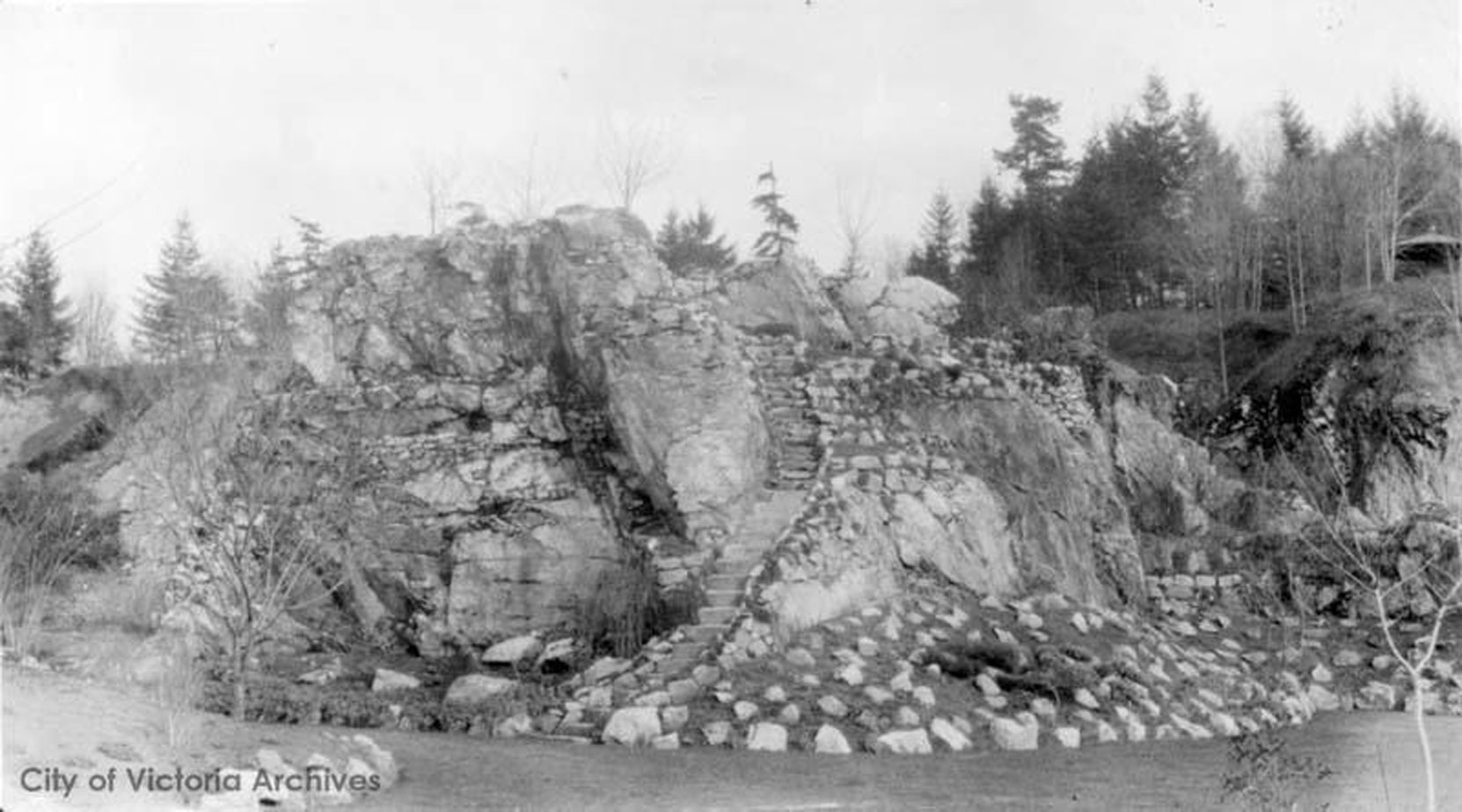 The Mound from the west side of the Sunken Garden, circa 1910. This section of the Sunken Garden was designed by Raoul Robillard. (City of Victoria Archives photo M05820)