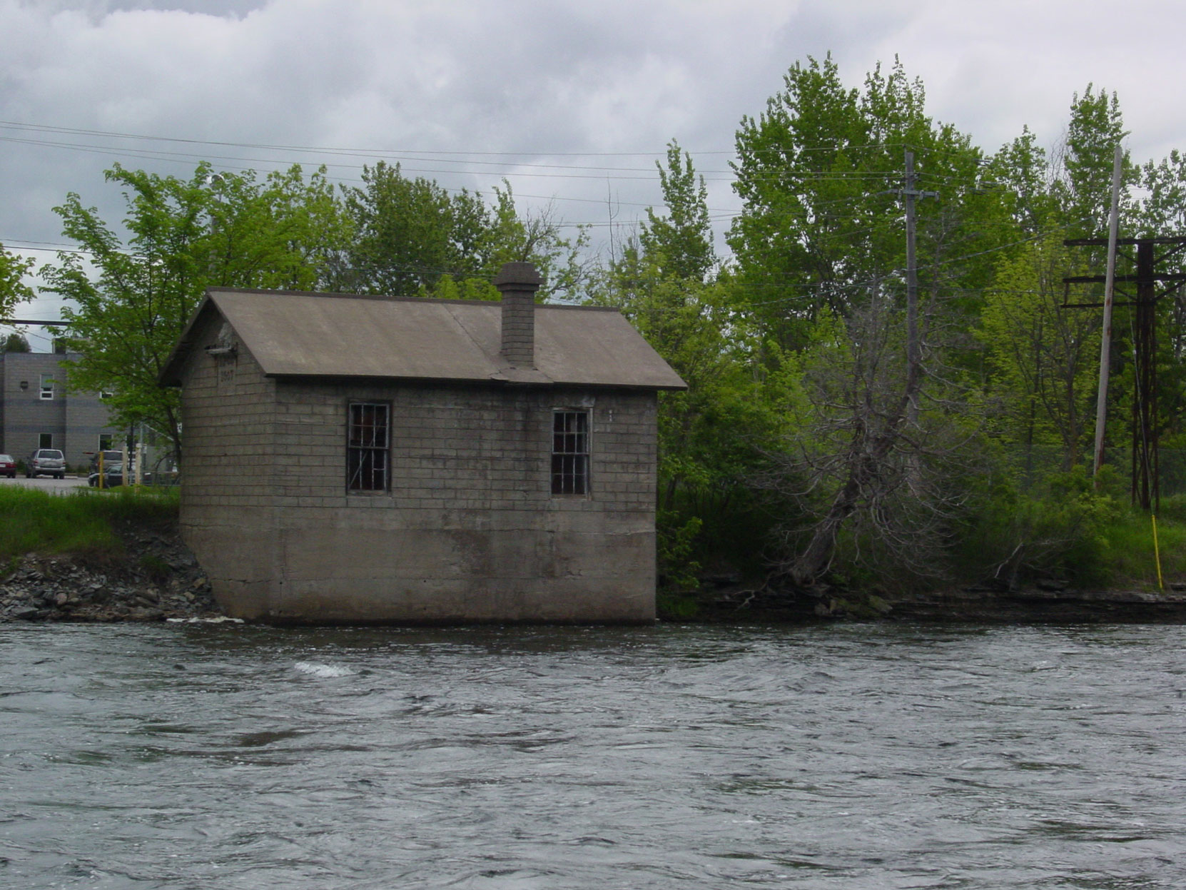 The Lakefield Portland Cement Company pumphouse, built in 1907, on the Otanabee River in Lakefield, Ontario (photo by Author)